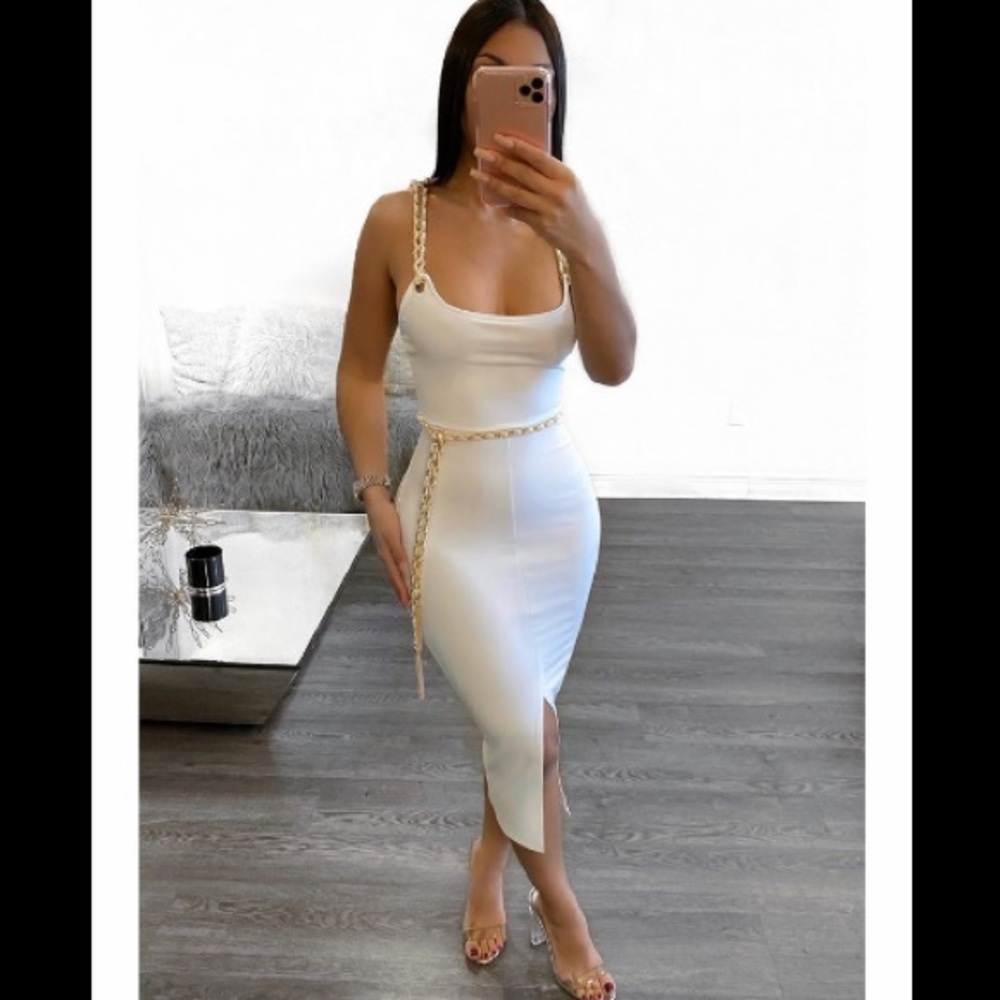 White knee length dress with gold chain